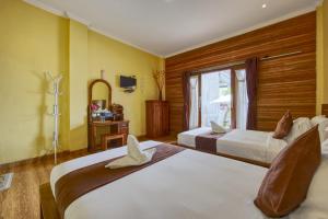 Phòng Deluxe 2 Giường Đơn Hướng Hồ Bơi (Deluxe Twin Pool View)