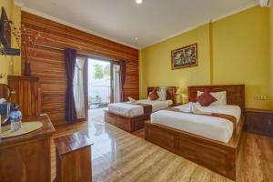 Phòng Deluxe 2 Giường Đơn Hướng Hồ Bơi (Deluxe Twin Pool View)