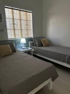 Japandi Home C - Fully Aircon, WIFI, Hot shower, 24hGuard, Center, near Malls