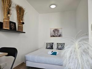 Appartements A112 Appartement Proche Disneyland Paris : photos des chambres