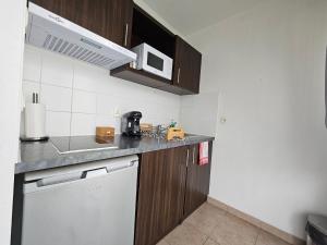 Appartements A112 Appartement Proche Disneyland Paris : photos des chambres