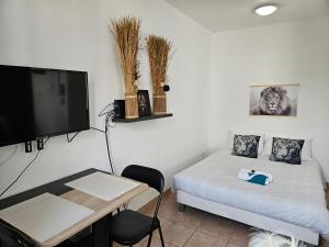 Appartements A112 Appartement Proche Disneyland Paris : photos des chambres