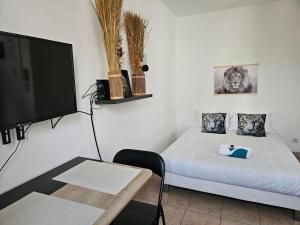 Appartements A112 Appartement Proche Disneyland Paris : photos des chambres