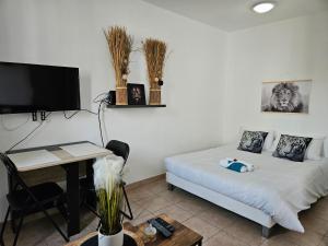 Appartements A112 Appartement Proche Disneyland Paris : photos des chambres