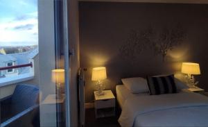 Appartements LE DUPLEX DU MARCHE : photos des chambres