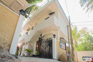 Induwara Villa - Ubytování bez kategorie ve městě Ahungalla