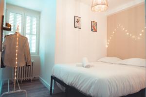 Appartements La Magie des numeros T3, proche Halles : photos des chambres