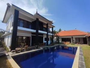 Роскошная вилла 4 спальни прямо на берегу океана на пляже Jasri beach - 八丹拜