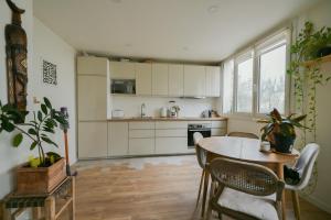 Appartements Appartement proche sites Olympiques : photos des chambres