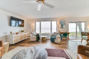 Bright Houghton Lake Home with Boat Dock and Fire Pit