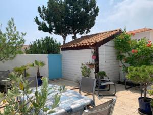 Charmante maison près du golf et plage avec terrasse et parking - FR-1-323-514
