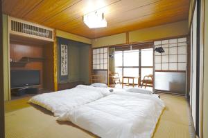 AKARIYA別館 ~横山邸~ - 4hvězdičkové hotely ve městě Karacu