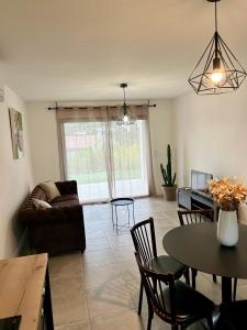 Appartements Bas de villa avec jardin idealement situe entre Ajaccio et Porticcio : photos des chambres
