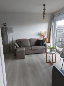 Gelijkvloers vakantie-appartement met groot zonnig terras