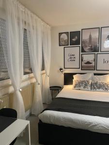 Appartements Travel Homes - Le Bright'N Cosy en pleine ville : photos des chambres