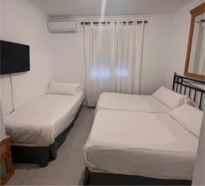 Triple Room room in Hostal Playa Hidalgo