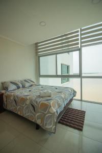 Lujoso Depa con piscina - jacuzzi y vista al rio desde la habitación