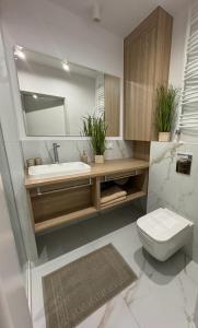 Apartament Whiteblue Dream 2 Kołobrzeg z ogródkiem & sauna & fitness & bawialnia dla dzieci