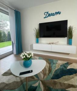 Apartament Whiteblue Dream 2 Kołobrzeg z ogródkiem & sauna & fitness & bawialnia dla dzieci