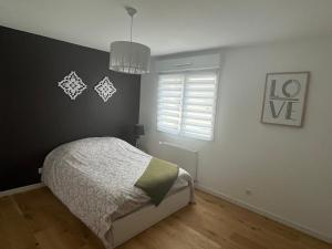 Villas Superbe Maison avec jardin : photos des chambres