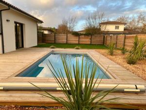 Maisons de vacances Villa entre Ocean et Bassin, piscine chauffee : photos des chambres