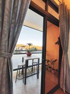 Chic Studio Unit with a Balcony and a View in Megatower Residences 3