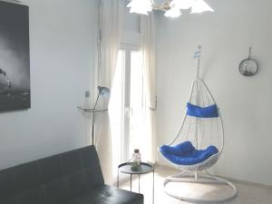 Blue swing chair apartment