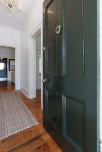 Central Elegance: Cottage Gem with Parking
