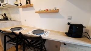 Appartements Studio du 104 : photos des chambres