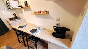 Appartements Studio du 104 : photos des chambres