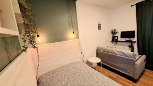 Appartements Studio du 104 : photos des chambres