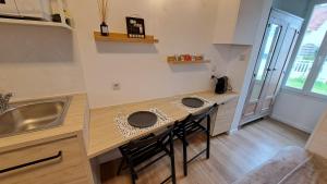 Appartements Studio du 104 : photos des chambres