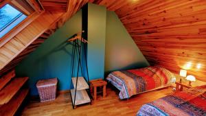 Maisons de vacances Menez Triaou - Maison avec grand jardin : photos des chambres