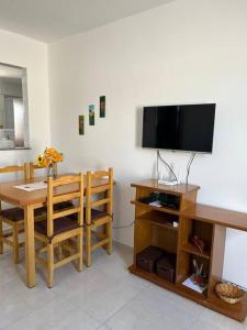 Apto 104: sol, mar e conforto.