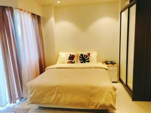 Laras cozy room @Tambuli Resort