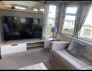 Experience Coastal Bliss in Our Modern 2019 Sea Viev 2 Bedroom static caravan at Clarach Bay Holiday Village!