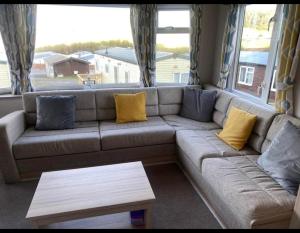Experience Coastal Bliss in Our Modern 2019 Sea Viev 2 Bedroom static caravan at Clarach Bay Holiday Village!