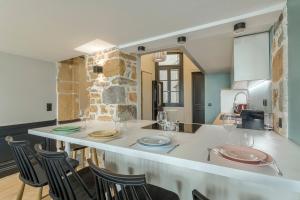 Appartements Le Bourgelat / 3 ch / 6 pers / 2 sdb : photos des chambres
