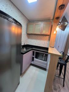 Kitnet - Nova - Canto do Forte - C Sacada.