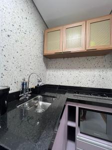 Kitnet - Nova - Canto do Forte - C Sacada.