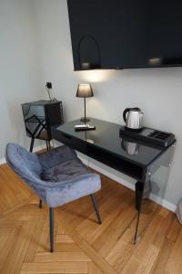 Habitación Cuádruple Deluxe con balcón