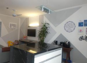 Apt Guarujá Enseada lado praia FAN 1 dorm Tv Netflix Wi-Fi Ar até 5 pessoas