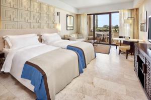 Deluxe Partial Sea View, Guest room, 2 Twin/Single Bed(s), Balcony room in The Romanos a Luxury Collection Resort Costa Navarino