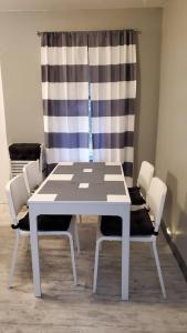 Cozy Cottages across from the Food Trucks of Aloha mall