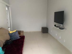 Piscina e área para churrasco