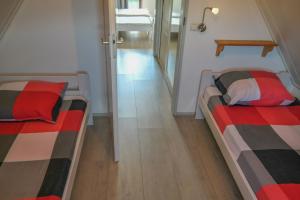 Lilian Modern Holiday home at a typical dutch canal, close to the Lauwersmeer