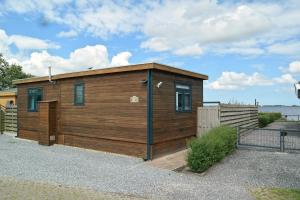 Lakeview 6 pers Holiday home Aurora with fenced garden, whirlpool and sauna
