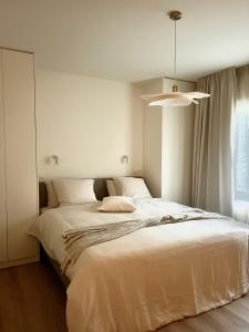 Gelijkvloers appartement met prive parking