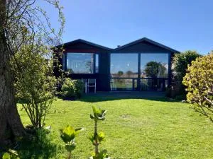 House Marijke with winter garden and direct access to the Lauwersmeer - Oostmahorn