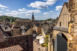 Appartements APPARTEMENT CENTRE MEDIEVAL SPACIEUX AVEC ASCENSEUR, La suite cosy de la boetie : photos des chambres